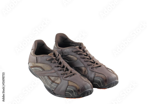 Men's brown leather sneakers. Isolated
