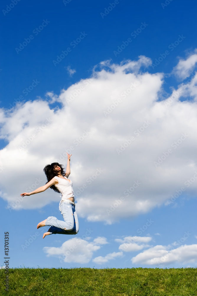 pretty young woman is jumping