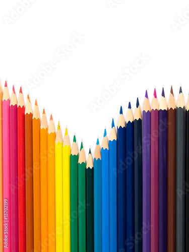 Assortment of colored pencils on white background