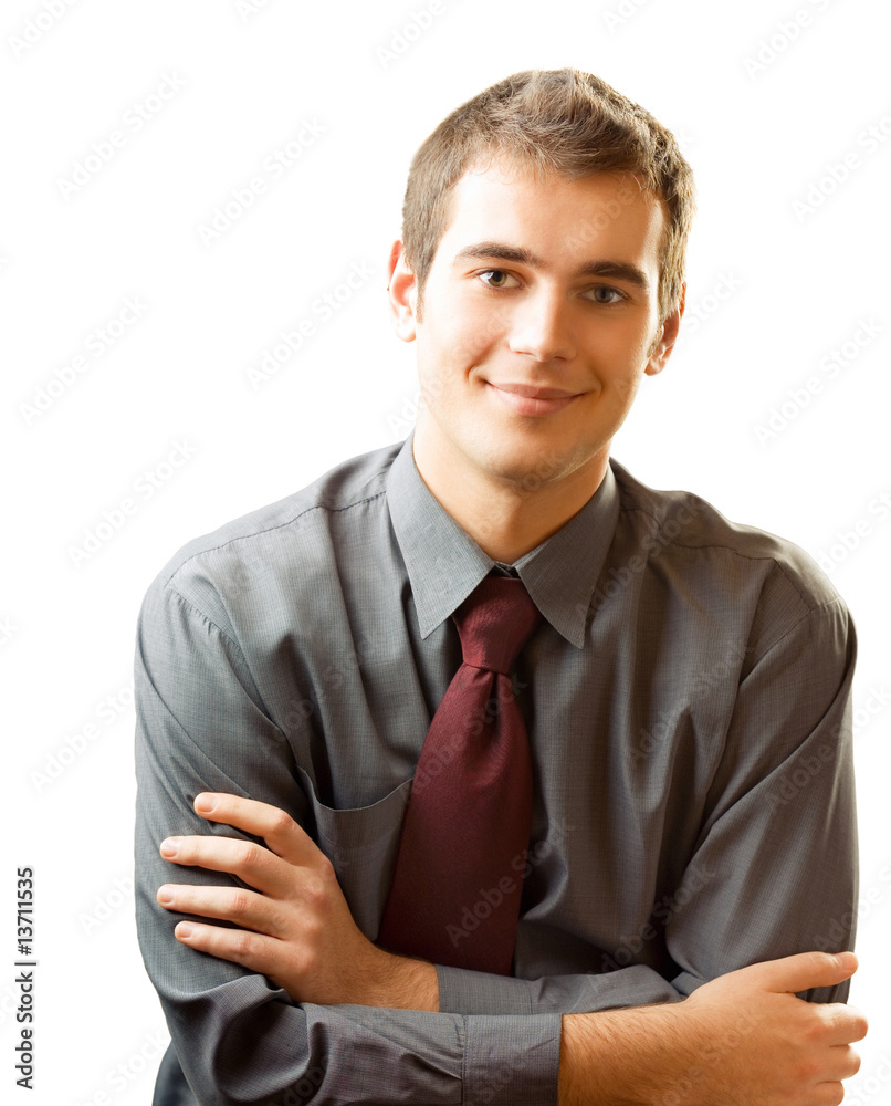 Young successful smiling student or businessman, isolated Young successful smiling student or businessman, isolated