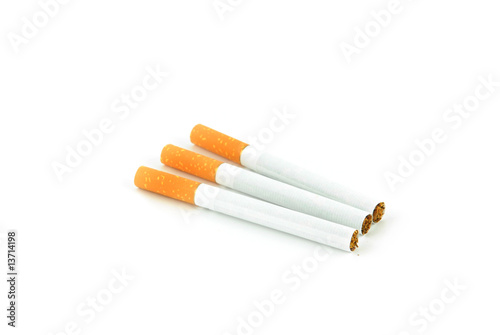 Three cigarets on white background photo