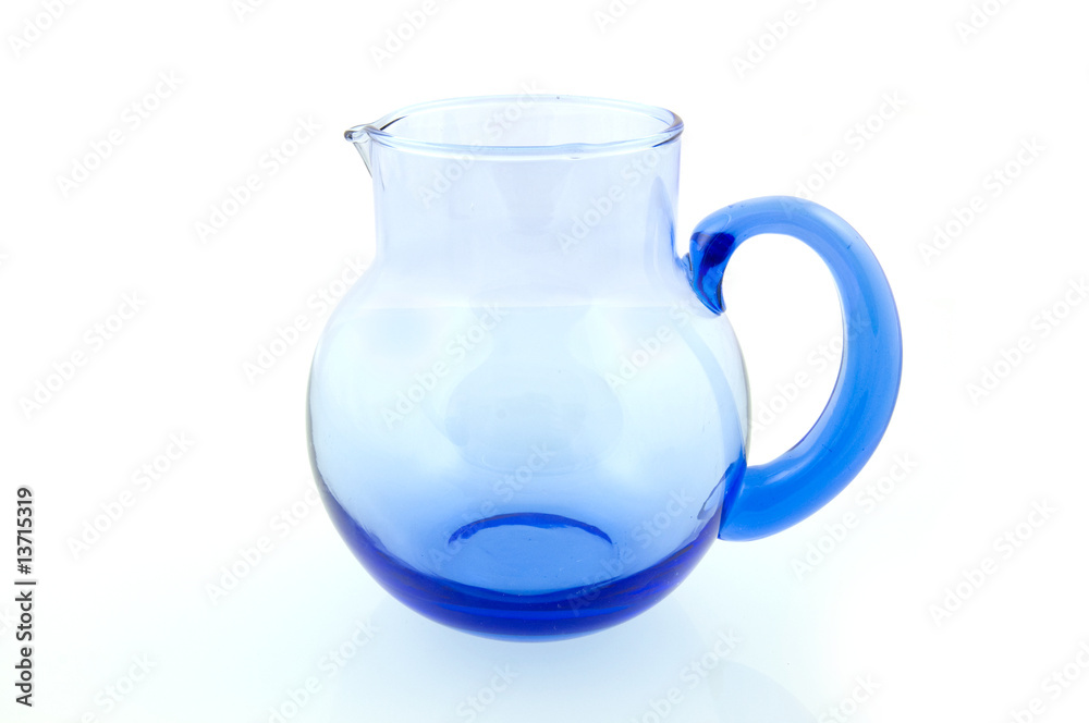 Blue glass watering can isolated on white background Blue glass watering can isolated on white background