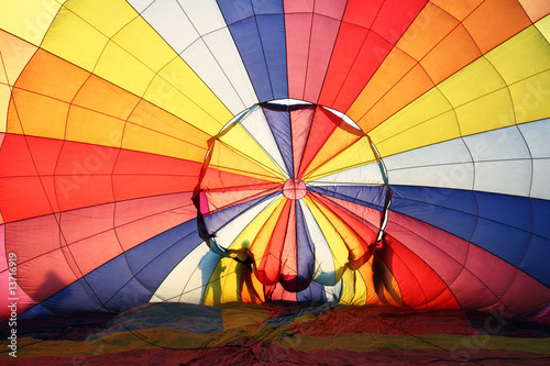 Hot air balloon and silhoutte of people