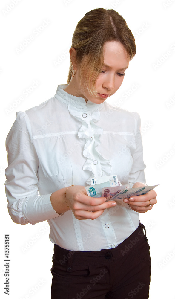 young serious girl considers money in hands young serious girl considers money in hands