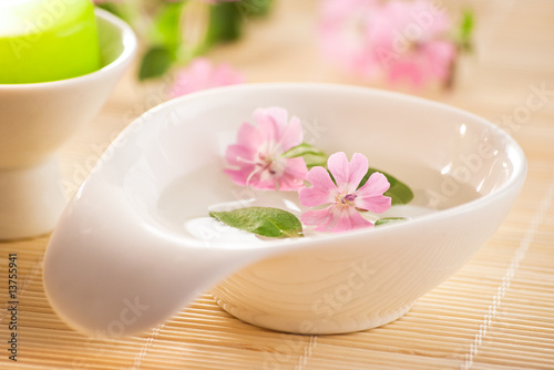 little bowl of water and flowers