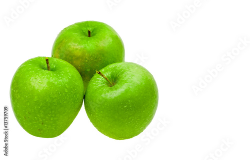 Close-up fresh apples with with water drops isolated on white