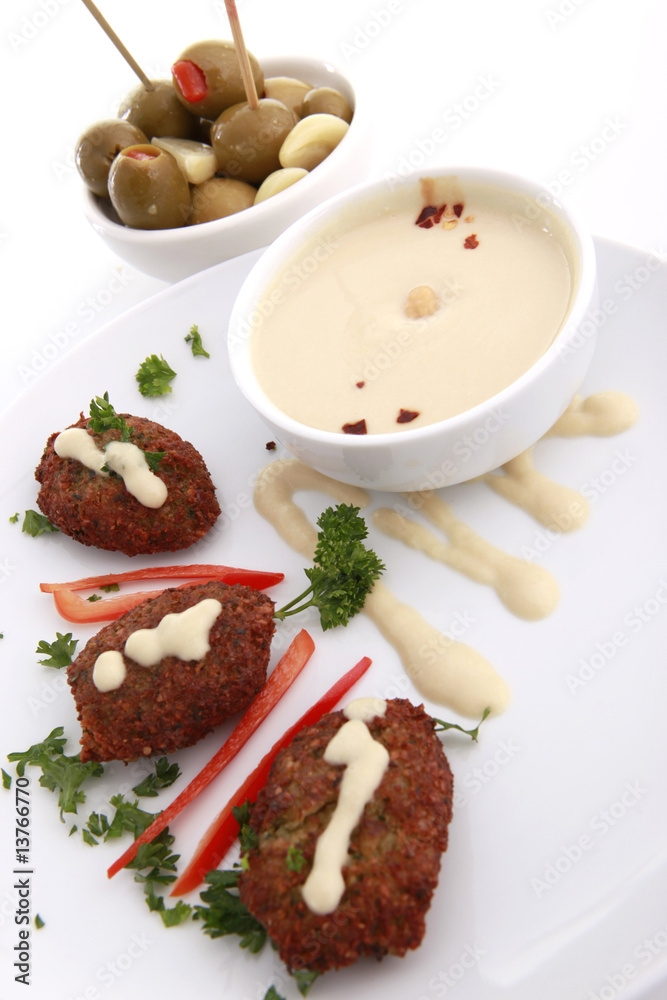 Fired kibbe, hummus tahina and olives