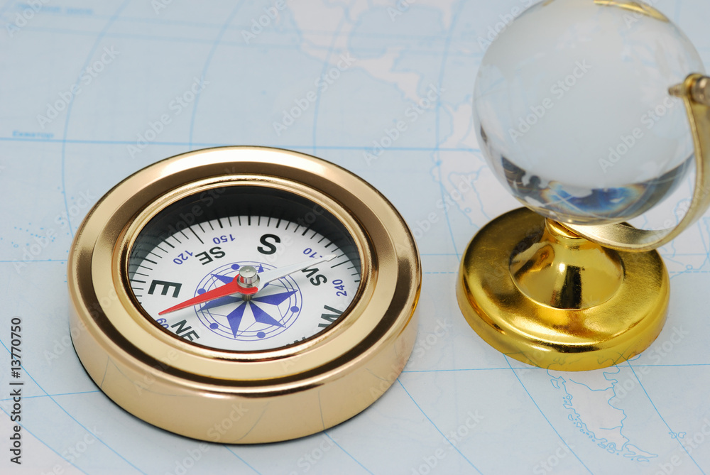 Compass and glass globe