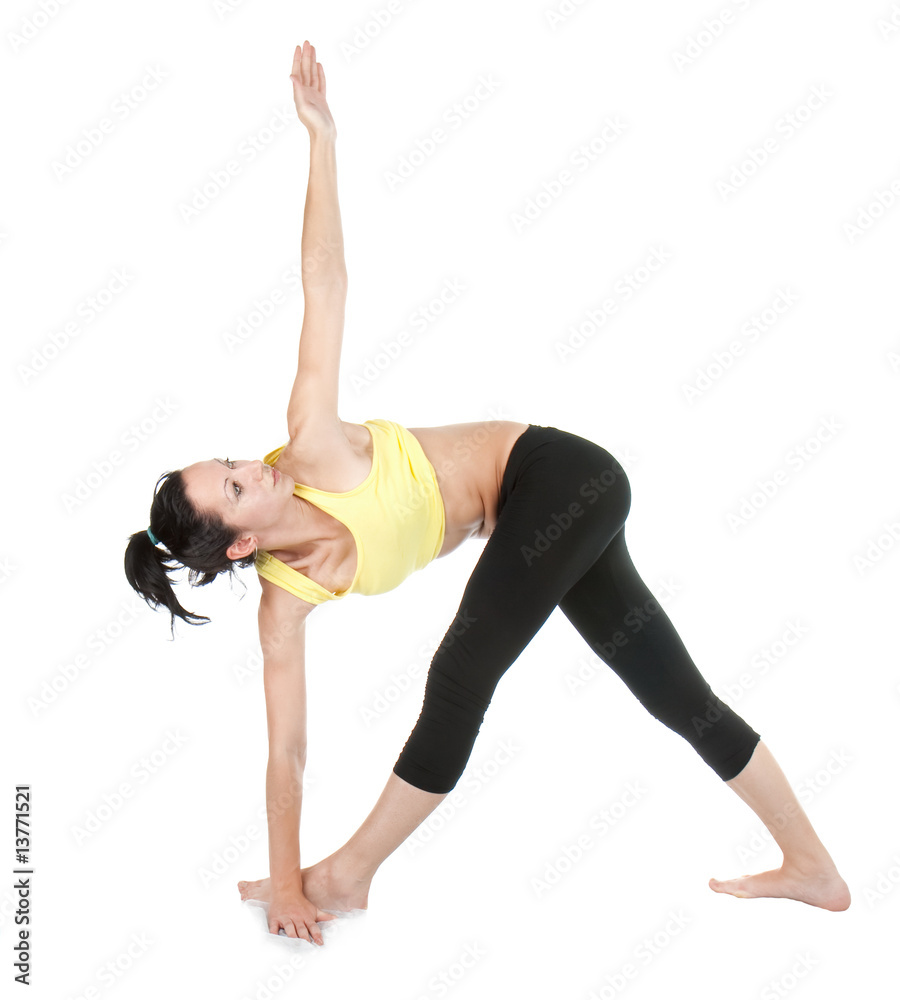 Young woman doing yoga exercise