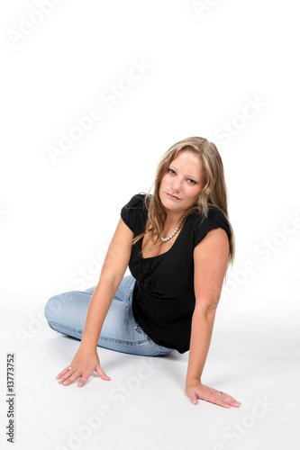 pretty woman in black shirt and pearl necklace