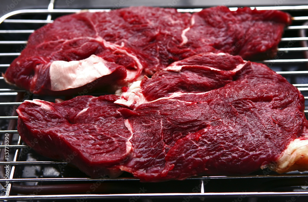 raw meat on bbq