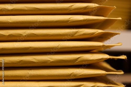 Close up shot of stack of padded mailing envelopes