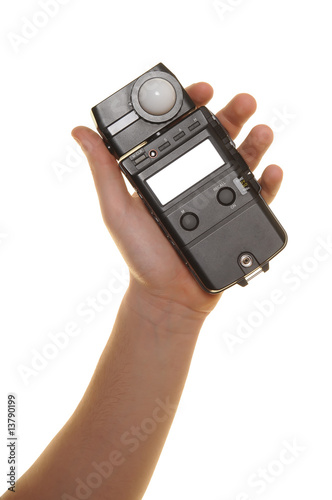 Canvas Print hand with exposure meter over white background