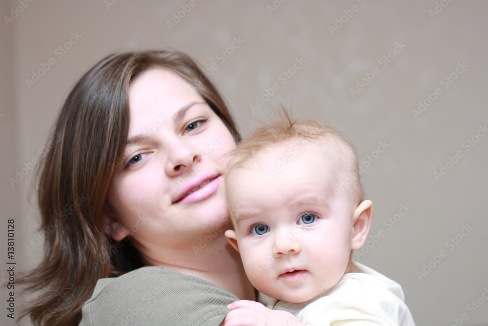 happy mother with a young baby happy mother with a young baby