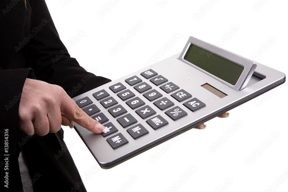 businesswomanÕs fingers touching calculator buttons businesswomanÕs fingers touching calculator buttons