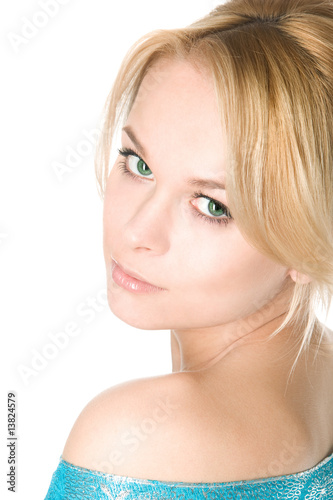 Close-up studio portrait of a beautiful fresh blond girl with pe