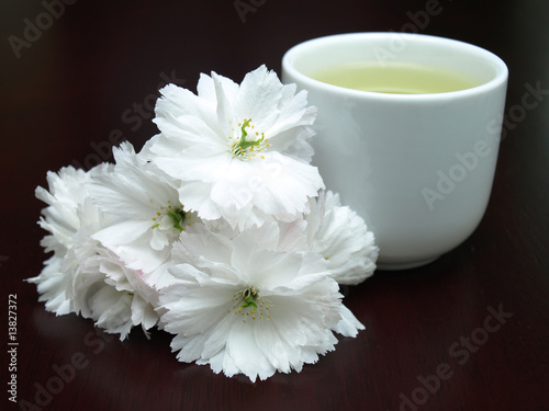 Teacup and Flowers on a kitchen table