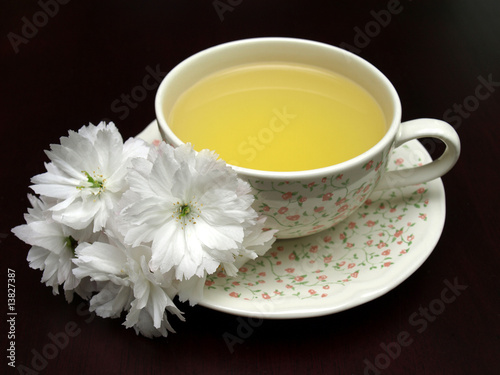 Spring floral tea on a dark background
