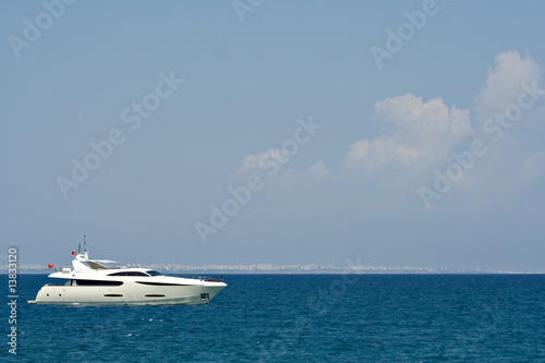 luxurious white yacht with space for text