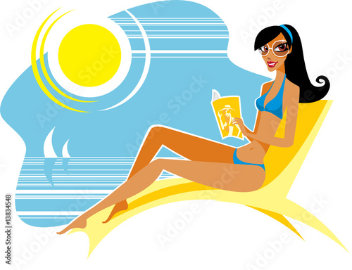 Girl on the beach reading magazine