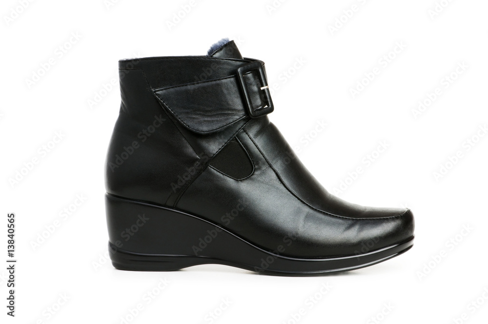 Black boots isolated on the white background Black boots isolated on the white background