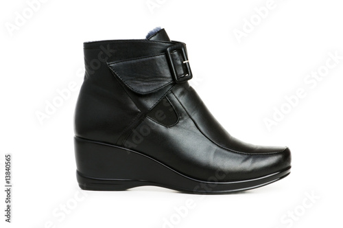 Black boots isolated on the white background © Elnur