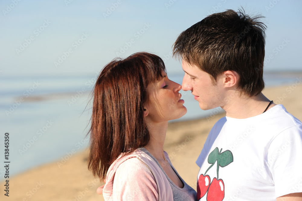 Young couple in love on the beach Young couple in love on the beach