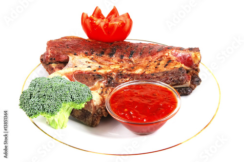 beef steak served with vegetables