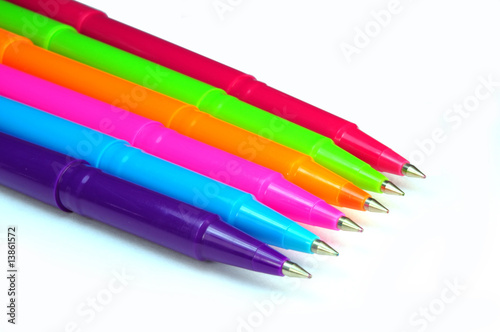 Set of multicolor pens on white background