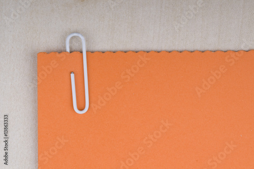 paper clip and blank note