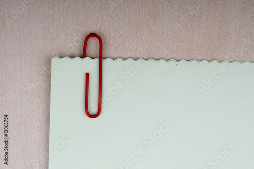 paper clip and blank note
