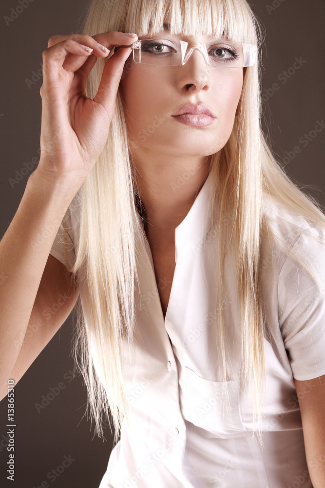 Obraz premium cute blonde in white medical gown and in glasses