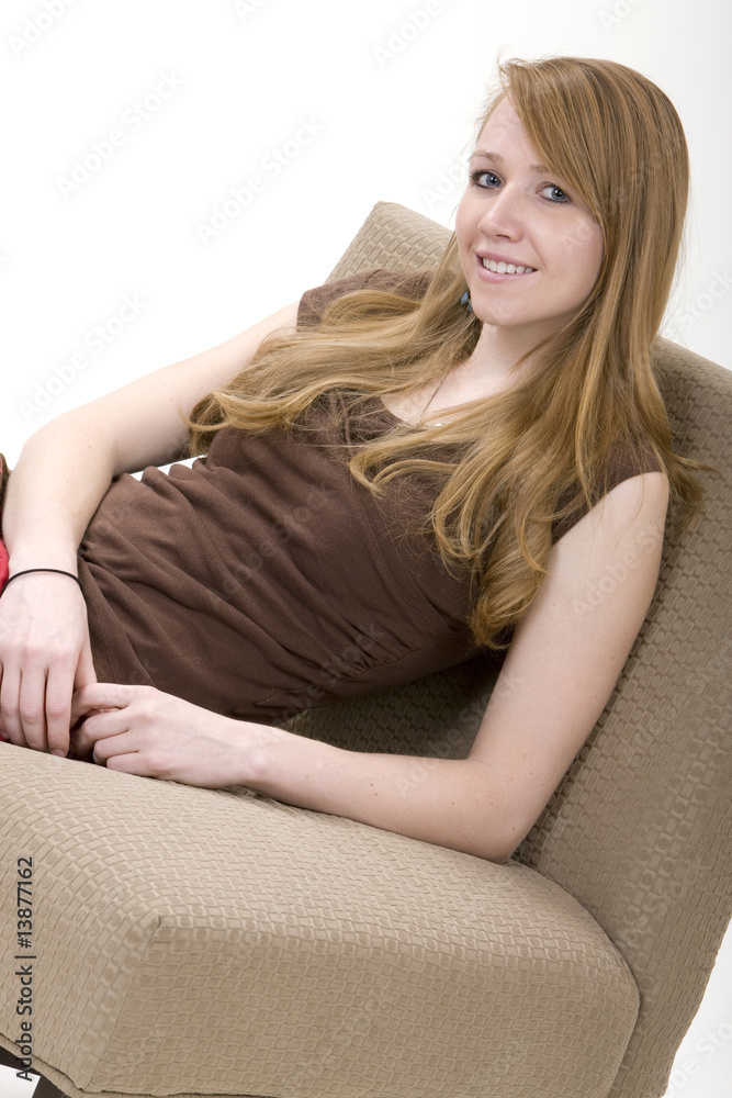 Young Woman Relaxing on a Chair Young Woman Relaxing on a Chair