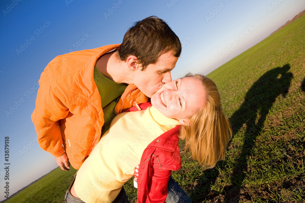 Fototapeta premium Young love couple kissed