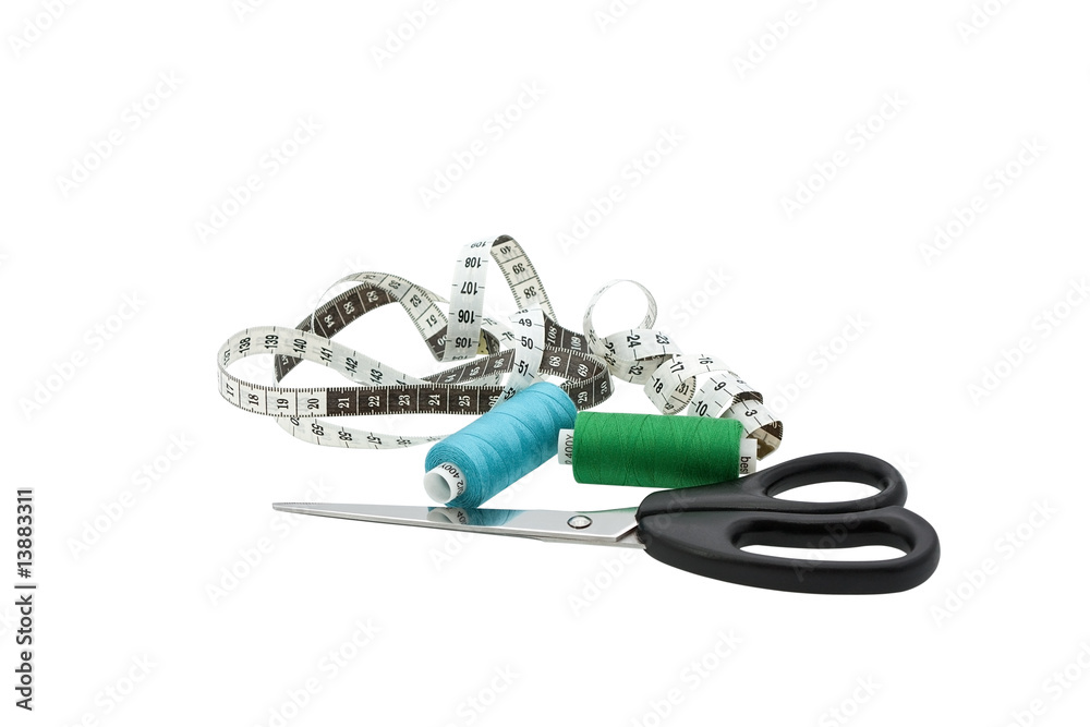 Tape measure and shears on the white background Tape measure and shears on the white background