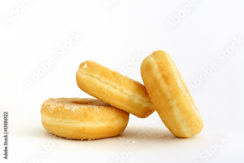 thre donuts on white background photo