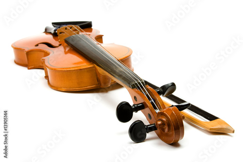 Violin and bow isolated on white.