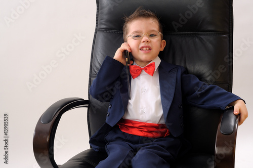 A boy talking with somebody photo