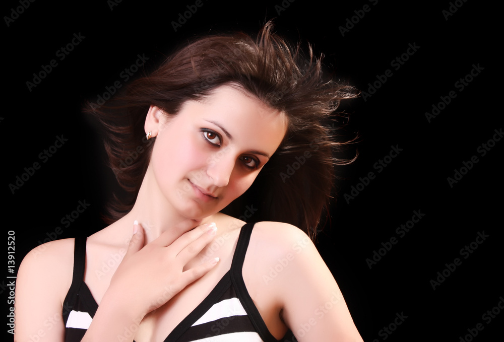 Naklejka premium Young beautiful woman portrait on black background