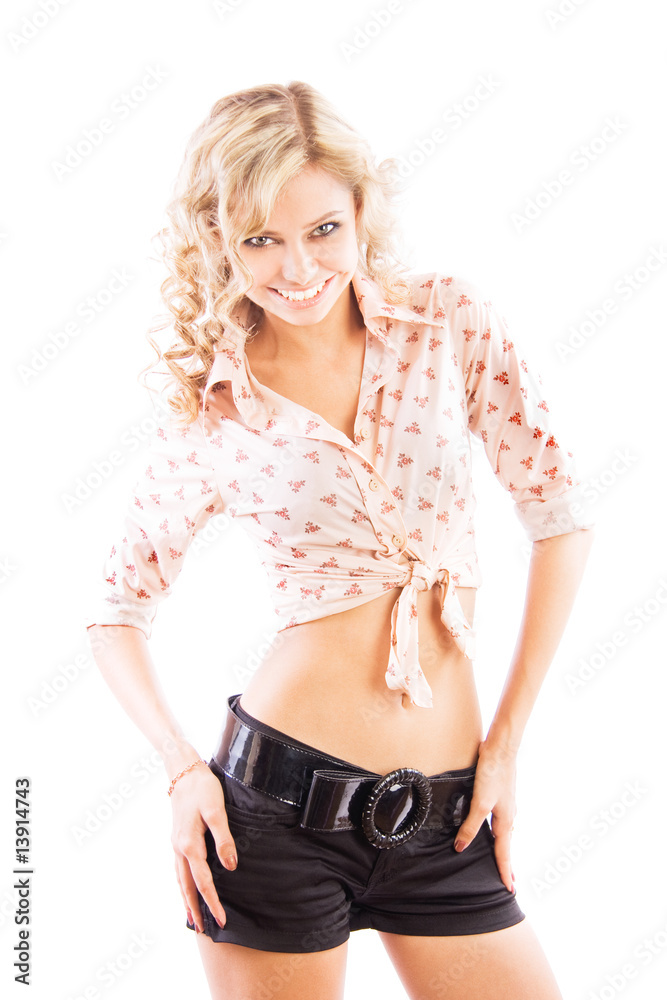Sexy young girl wearing black shorts, isolated on white Sexy young girl wearing black shorts, isolated on white