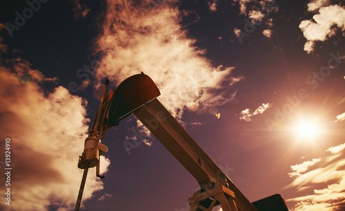 Part of oil pump against sky photo