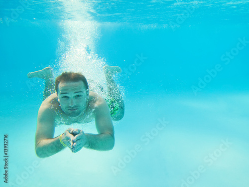 Man swimming under water