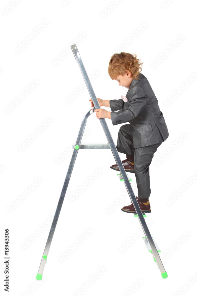 boy in suit rises on step-ladder boy in suit rises on step-ladder