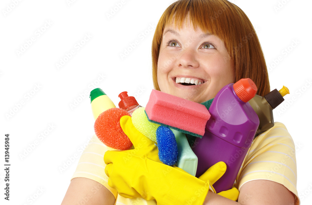 Happy girl holding dish washing liquids Happy girl holding dish washing liquids