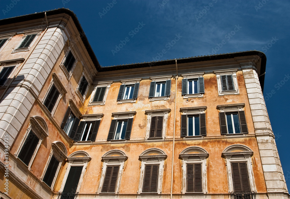 Old orange building in Rome.