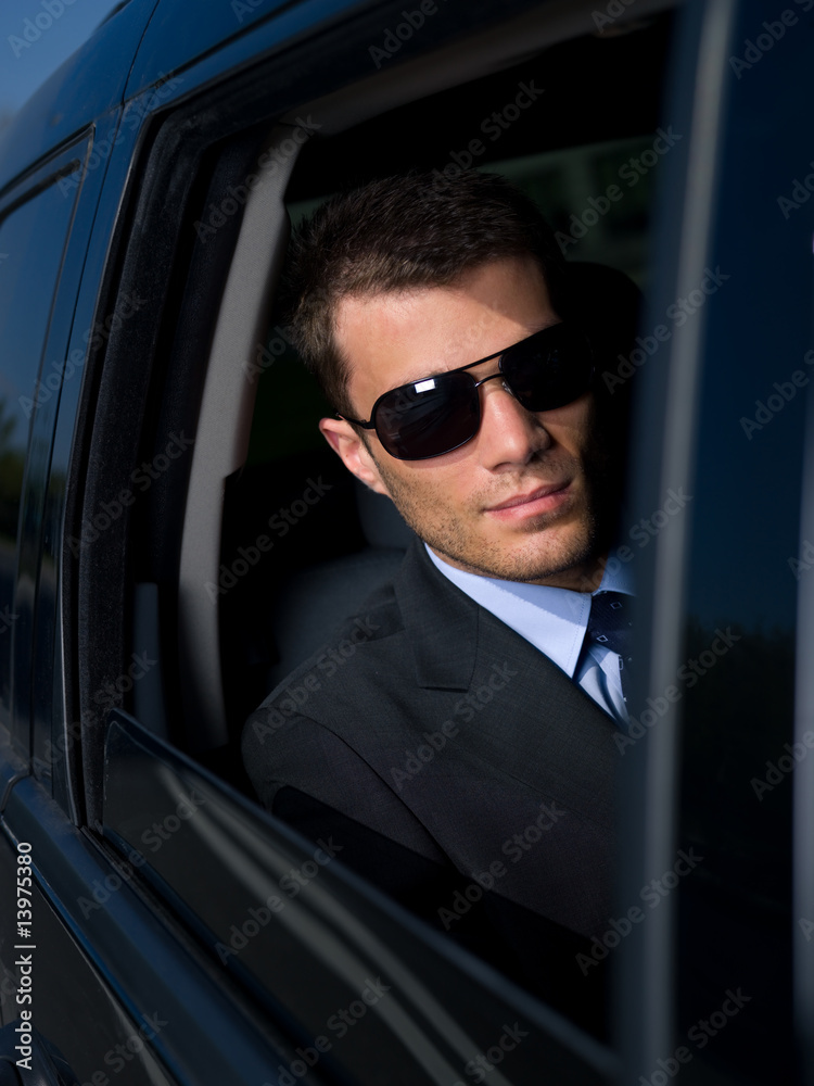 Portrait of business man in car Portrait of business man in car