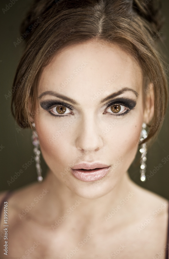 Portrait of a cute brunette with amazing eyes Portrait of a cute brunette with amazing eyes