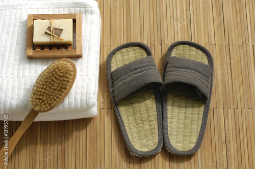 bath accessories on the bamboo mat