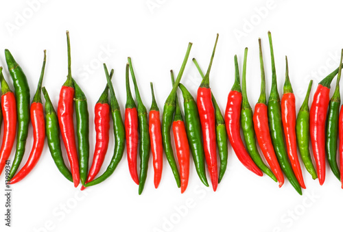 Red and green peppers isolated on white