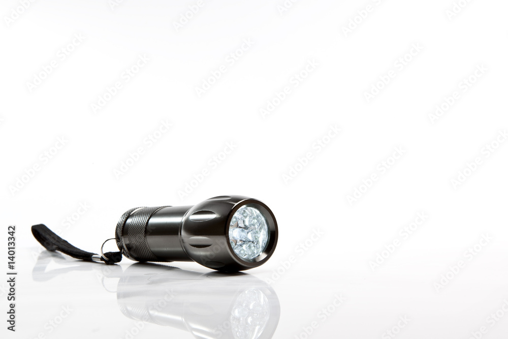 LED Flashlight on the white background with copy space LED Flashlight on the white background with copy space